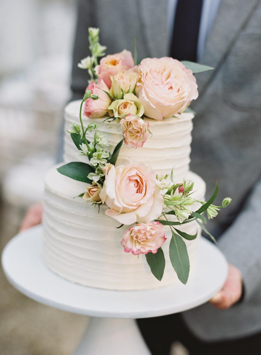 The Secret Meaning Behind How Couples Cut Their Wedding Cake | The Kitchn